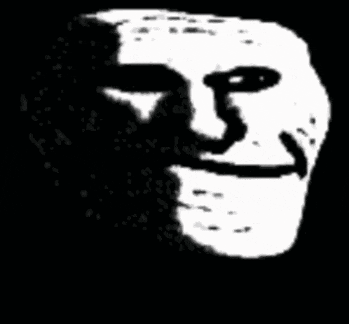 a black and white drawing of a troll face with a big smile on a black background .
