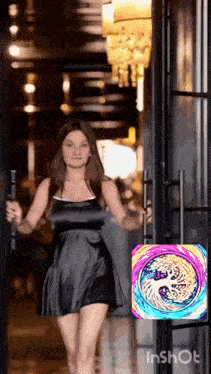 a woman in a black dress opens a door next to a colorful circle that says inshot
