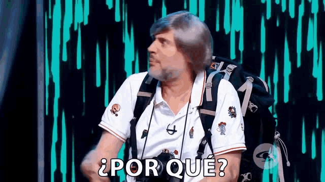 a man wearing a backpack and a wig is asking why .
