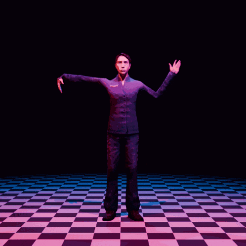a man in a suit stands on a checkered floor