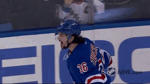 a hockey player with the number 36 on his shirt