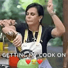 a woman in an apron is pouring a drink into a teapot .