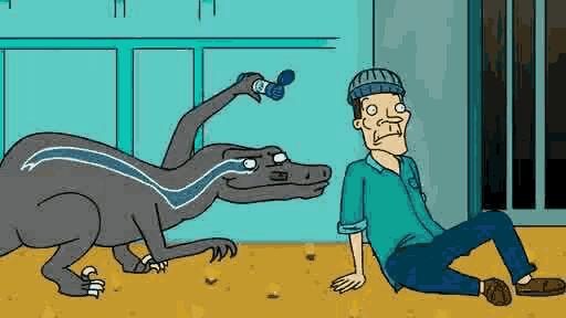 a man is sitting on the floor next to a cartoon dinosaur .