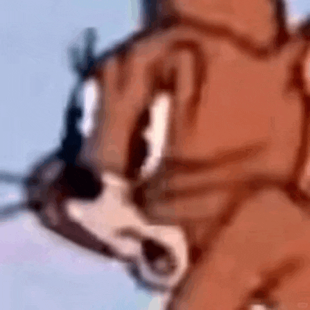 a close up of a cartoon cat with a surprised look on his face .