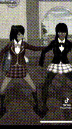 a black and white image of two girls in school uniforms dancing