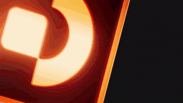 a close up of an orange sign with a glowing letter d on it