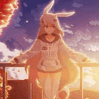 a girl in a bunny costume is standing on a balcony at sunset .
