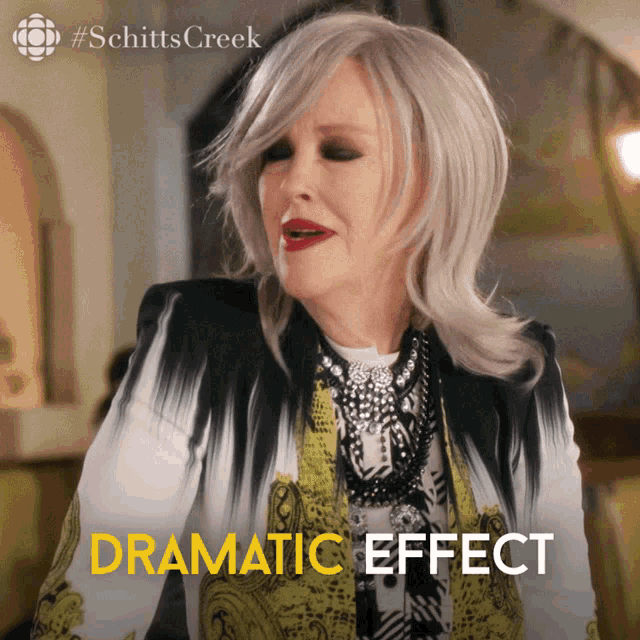a poster for schitts creek shows a woman wearing a black and yellow jacket