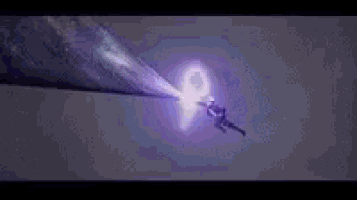 a purple lightning bolt is coming from a person 's hand .