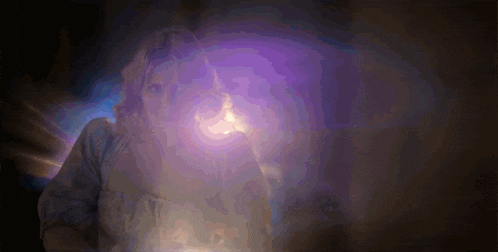 a woman with a purple light coming out of her mouth
