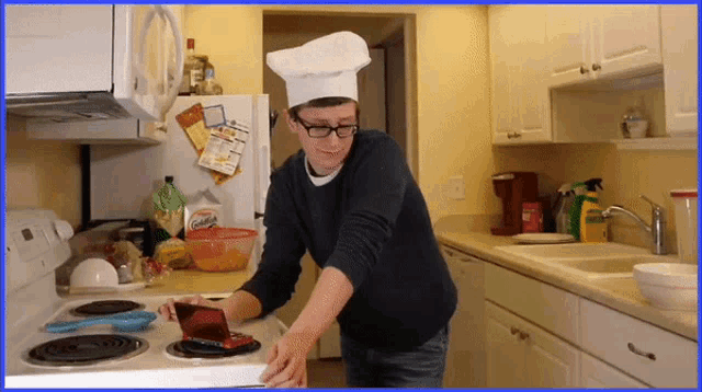 a man wearing a chef 's hat and glasses is cooking