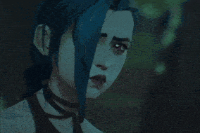 a close up of a cartoon character 's face with blue hair