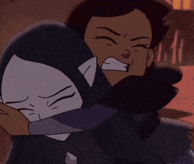 a couple of cartoon characters are hugging each other and one of them is holding the other 's face .