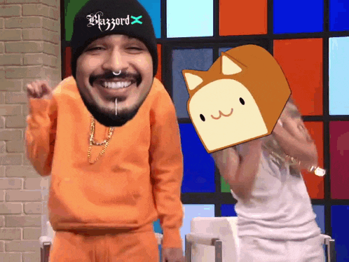 a man wearing a beanie that says blizzard stands next to another man