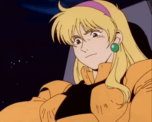 a cartoon character with blonde hair and green earrings looks angry