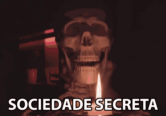 a skeleton holding a lit candle with the words sociedade secreta behind it