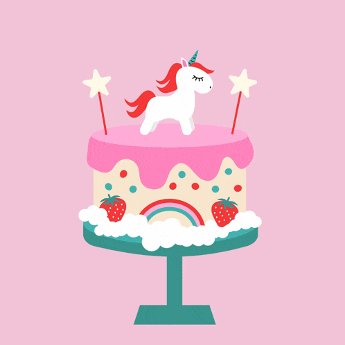 a cake with a unicorn on top and strawberries on it