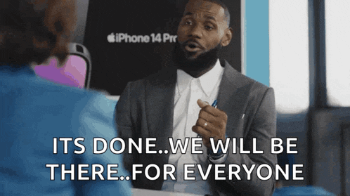 a man in a suit is talking to a woman and says " it 's done ... we will be there ... for everyone "