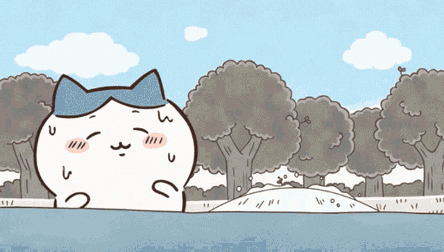 a cartoon drawing of a cat with a blue bow on his head