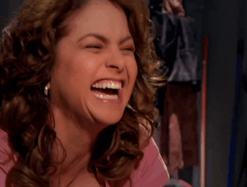a woman is laughing with the name lialmeida05 on the bottom right