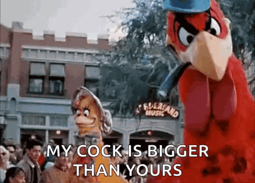 a couple of cartoon characters are standing next to each other in front of a crowd .