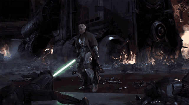 a man is holding a green lightsaber in front of a building