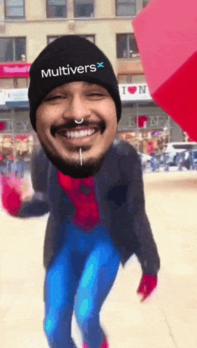a man wearing a beanie that says multivers x on it