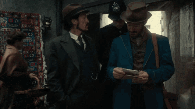 a man in a suit and hat says look away son be not corrupted by this devilish fith