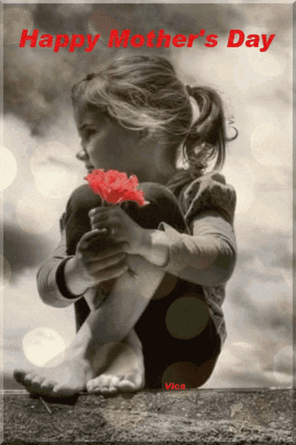 a black and white photo of a little girl holding a red flower with the words happy mother 's day