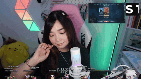 a girl is playing a video game with a screen that says s1