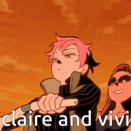 claire and vivi are standing next to each other with a sunset in the background