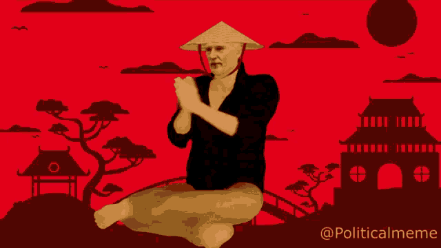 a man in a conical hat sits on the ground in front of a red background