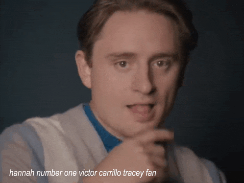 a close up of a man with the words hannah number one victor carrillo tracey fan above him