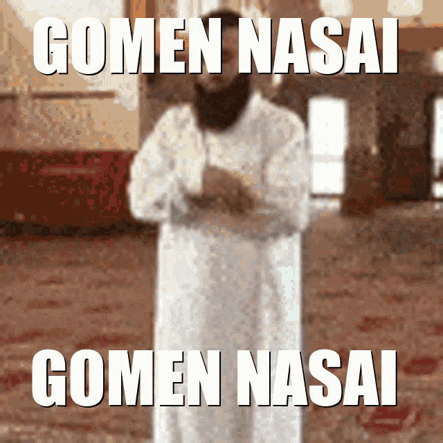 a blurred image of a man praying with the words gomen nasai