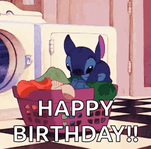 a cartoon character is sitting in a laundry basket with the words `` happy birthday ! ''