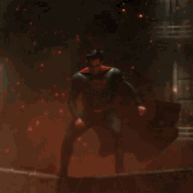 a man in a superman costume with a cape