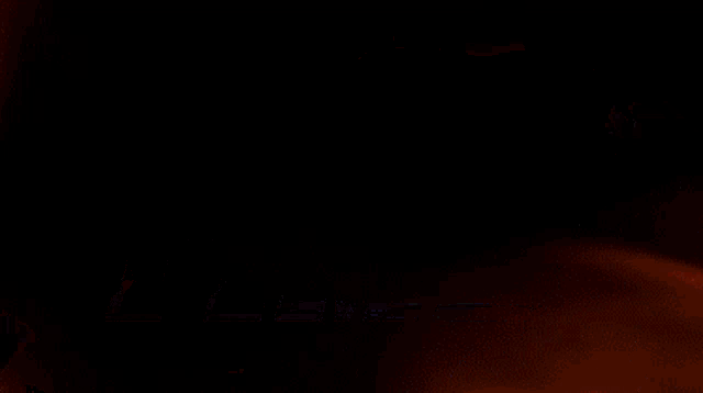 a close up of flames on a black background .