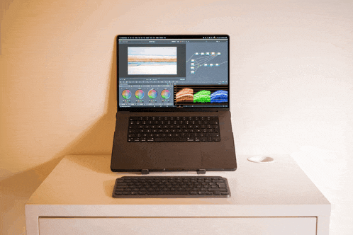 a laptop is open to a screen that says ' adobe premiere ' on it