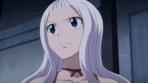 a girl with white hair and blue eyes has a red necklace around her neck