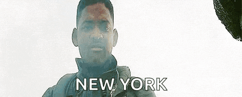 a man is holding a sword in front of a white background and the words `` new york '' are visible .