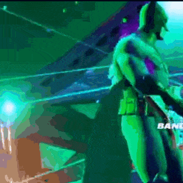 a man in a green costume is standing in front of a band