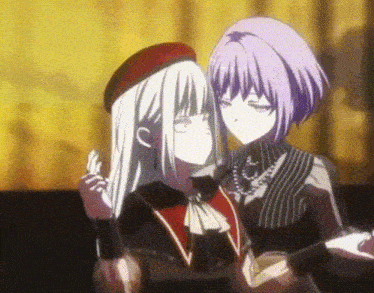 two anime girls are standing next to each other .
