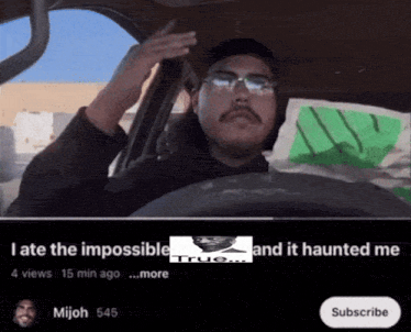 a man driving a car with the words late the impossible and it haunted me on the bottom