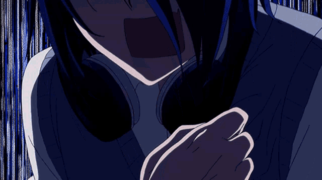 a close up of a person with blue hair