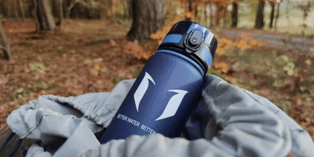 a blue bottle that says better water better