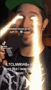 a man with glowing eyes and a caption that says ' i 'm oworker music is so tuff '