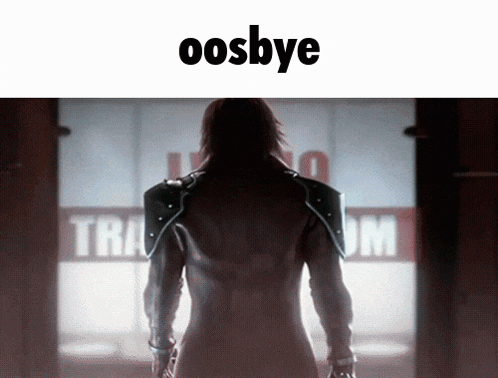 a man in a leather jacket is standing in front of a sign that says oosbye