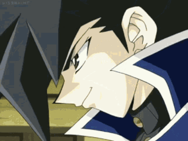 a close up of a cartoon character 's face with the letters kc on it