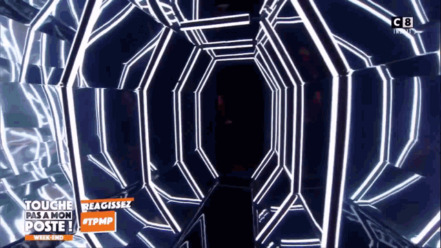 an advertisement for touche pas a mon poste shows a tunnel of lights