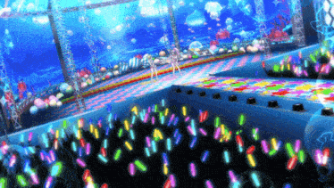a girl stands on a stage in front of a crowd